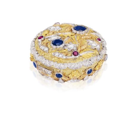 A GEM-SET AND DIAMOND PILL BOX, BY CAZZANIGA The bi-coloured circular box decorated with floral and scrolled motifs, set thro