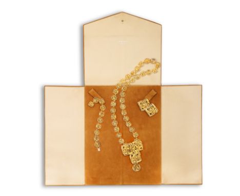 AN 18K GOLD NECKLACE, BRACELET, BROOCH AND EARCLIPS EN SUITE, BY CHAUMET, CIRCA 1970  Each composed of openwork square and ro