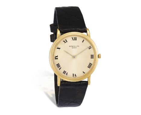 AN 18K GOLD WRISTWATCH, BY PATEK PHILIPPE, CIRCA 1995  18-jewels, Cal-175 manual wind, the circular golden dial, black Roman 
