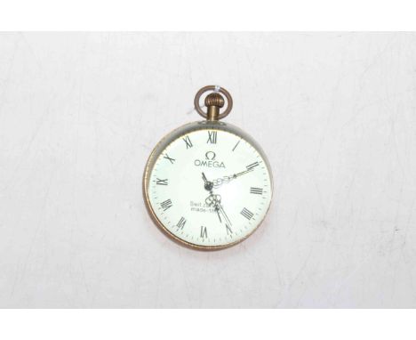 Glass and brass spherical desk clock.