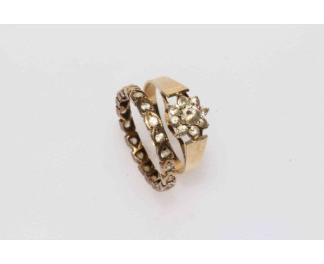 9 carat gold and diamond cluster ring and an eternity ring (2).