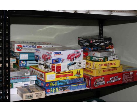 Shelf of model vehicles and toys including Airfix, Revell, Matchbox, Star Trek.