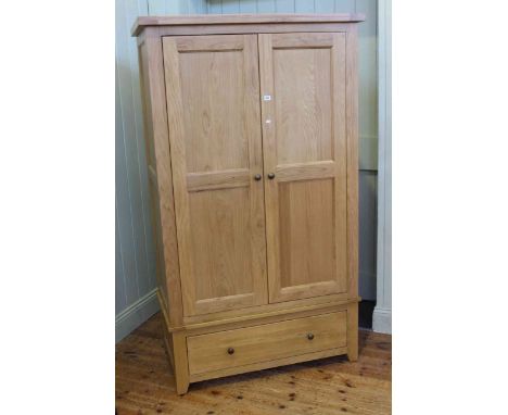 Little used light oak double door wardrobe, 193cm by 112cm.