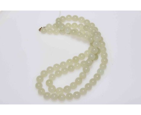 White jade uniform bead necklace with 9 carat gold ring clasp, length 80cm.