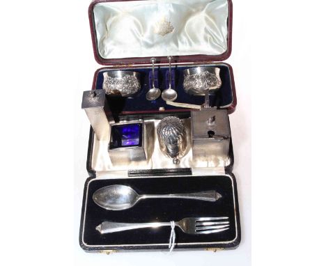 Silver cruet set, silver christening fork and spoon and four silver condiments.