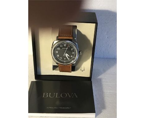 A Bulova watch in excellent condition with original box and manual.