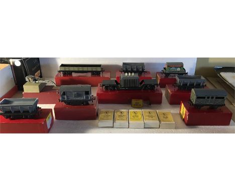 A large collection of Trix Twin Railways models to include 666 Operating Dump Wagon x 3, 639 Container Wagon, Cattle wagon, 7
