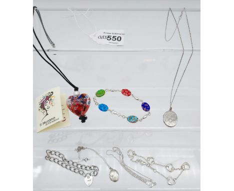 A Selection of silver jewellery to include charm gate bracelet, locket pendants with chains and art glass pendant and bracele