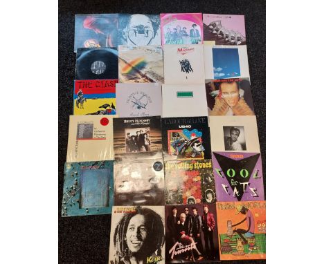 A Collection of records to include ELO, Bob Marley, Squeeze, Rolling Stones, Adam and the Ants and the clash 