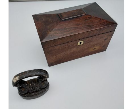 A Victorian two section tea caddy together with a cast iron desk paperweight. 