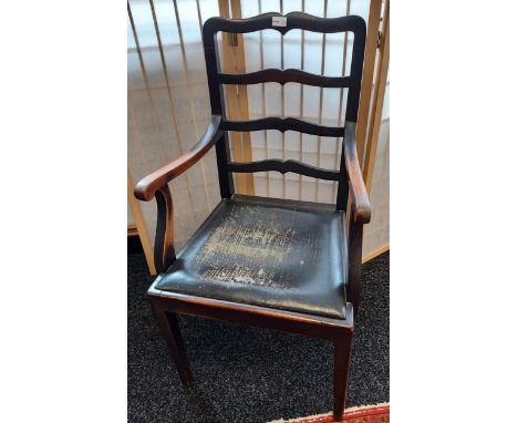 A 19TH CENTURY Ships ladder back arm chair. 