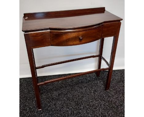 A dark wood console table, with bow front single drawer, raised on square legs, united with stretchers [77x70x30cm] 