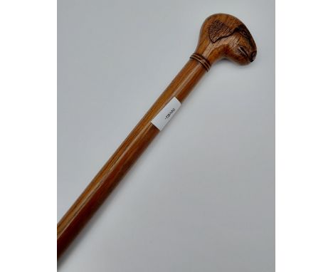 Antique walking stick designed with a hand carved hand in the form of a sheep head. [86.5cm in length] 