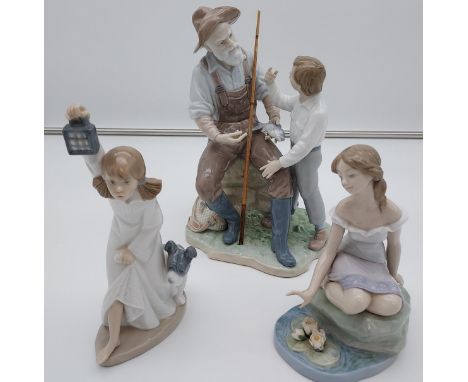 Three various Lladro and Nao figurines to include BM17A and 6E57Z- as found. 