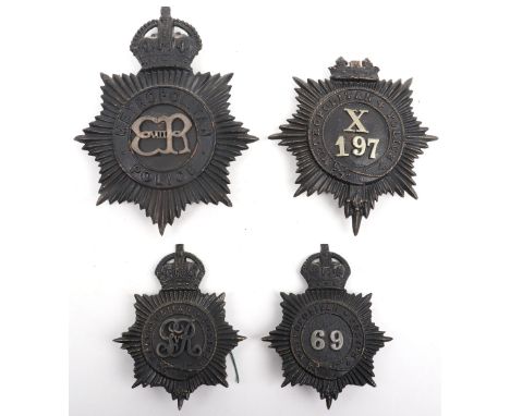 Four Metropolitan Police Badges, Kings crown black star, with reproduction Edward VIII cypher, Black star, missing crown, whi