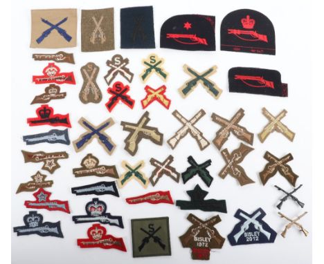 Quantity of British Army Rifleman Marksman Trade / Proficiency Badges, mostly cloth of various types and periods. Bisley Shoo