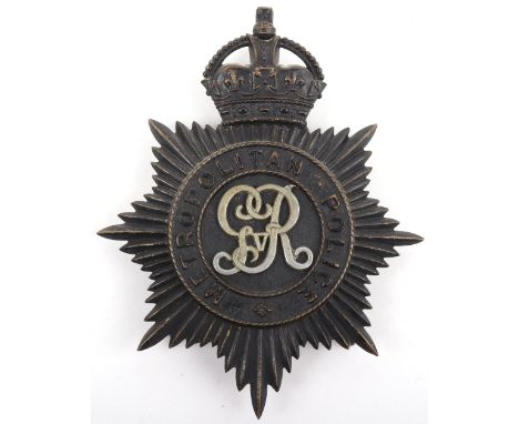 Metropolitan Police George V Helmet Plate, Kings crown, black star, white metal GVR centre, 