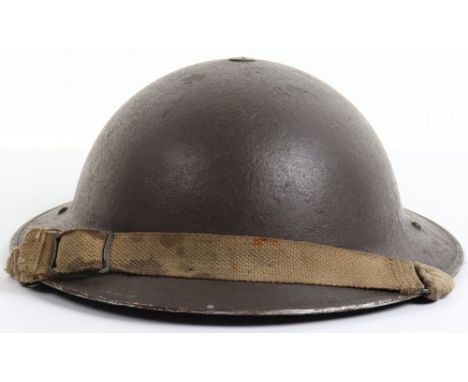 WW2 British Steel Combat Helmet, fine example of a standard pattern British steel combat helmet. Retains much of its original