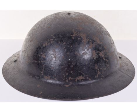WW1 British Steel Helmet Re-issued to WW2 Civilian Defence, interesting example of a Great War raw edge brodie helmet which h