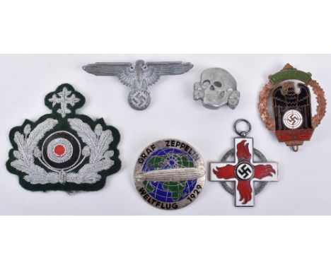 WW2 German Badges and Awards: Fire service medal , Zeppelin badge, SS cap badges and others. We believe these examples to be 