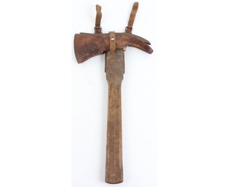 German Military Pioneers Axe, having wooden haft and steel axe head stamped with unclear mark. Complete with its original bro