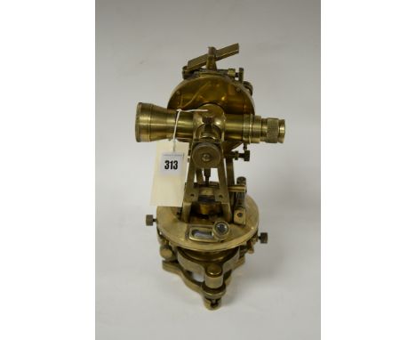 A reproduction brass theodolite compass, stamped Stanley, London.