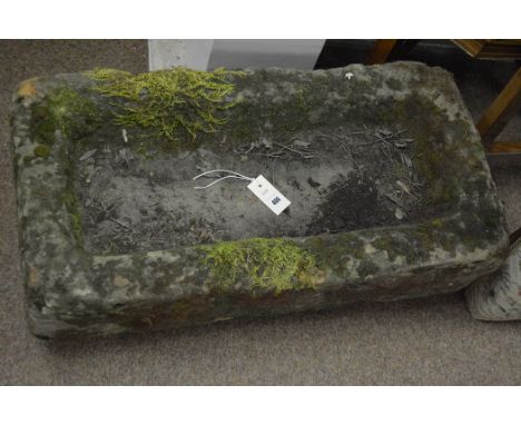 A carved sandstone garden trough, 77cms wide.