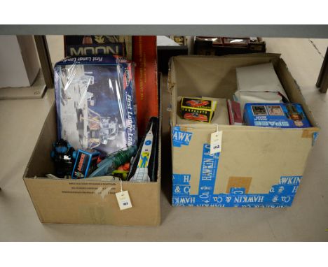 Toys and models relating to space; to include: Space Walkman Robot; rockets; and a selection of tinplate toys, in two boxes.