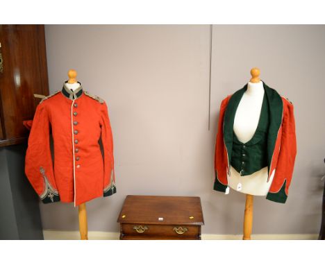 Two British Army jackets, one dress with silver plated buttons, the other mess with green trim and matching tunic; together w