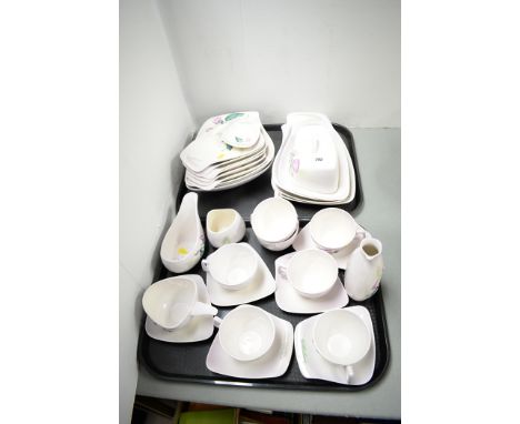 A Carlton ware 'Australian design' tea and dessert service, to include: tea cups and saucers, plates, bowls and other items.