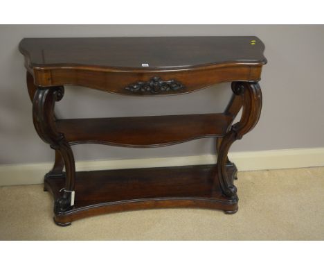 A Victorian walnut serpentine front console table, 118cms wide.