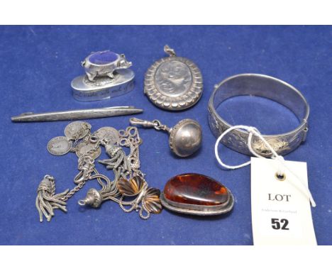 Silver items, to include: a bangle; a photo pendant; other items, to include: an amber brooch on white metal mount; and a tri