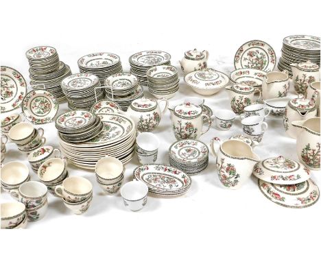 An extensive service of Johnson Bros Indian Tree pattern dinner and tea wares, including dinner plates, soup plates, lidded j