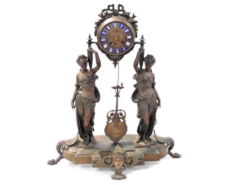 A 19thC French bronzed spelter figural clock, the dial with blue and white enamel Roman numerals, supported by two Neoclassic