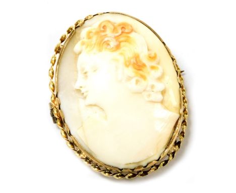 A shell cameo brooch, bust portrait of a lady, in a yellow metal mount, stamped 9ct, 4cm high, 3cm wide. 