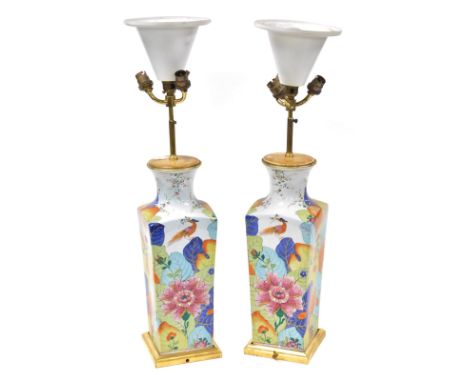 A pair of 20thC Continental porcelain table lamps, of tapering square form, chinoiserie decorated with exotic flowers, leaves