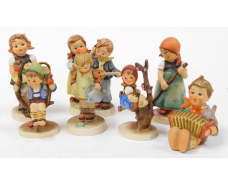 Eight Goebel Hummel porcelain figures, comprising Lets Sing, Sister, Little Gardener, Apple Tree Girl, Happy Days, Apple Tree
