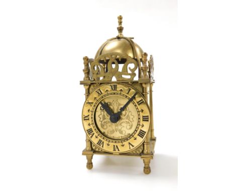 A Smiths Clocks and Watches electric driven brass lantern clock, of conventional form, 18cm high.