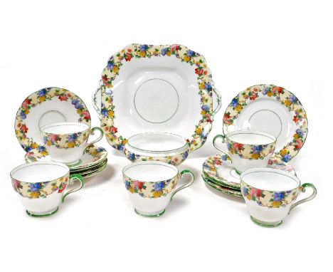An early 20thC Aynsley porcelain part tea service, decorated with blossom, pattern number B1494, comprising bread plate, suga