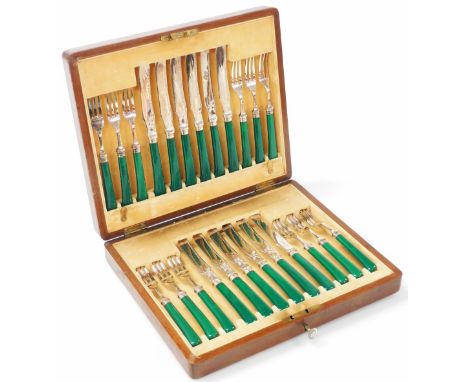 A set of twelve Edward VII dessert knives and forks, with electroplated blades and prongs, silver collar and a green simulate