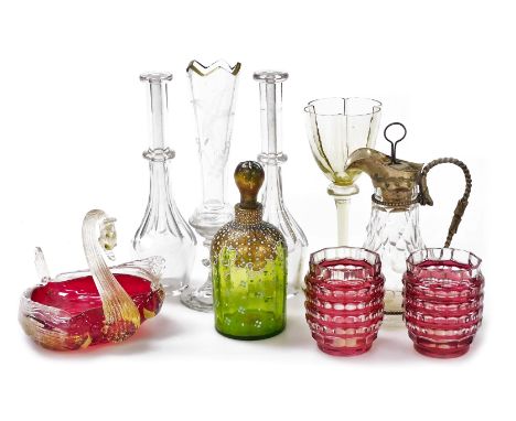 A group of glassware, including two Georgian toddy lifters, Venetian ruby glass dish modelled as a swan, Continental green gl