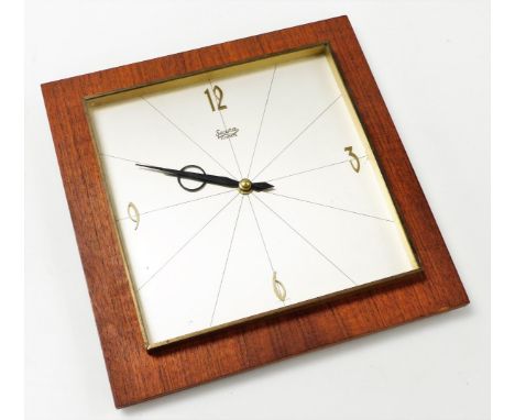 A mid century Secura Elexacta teak cased wall clock, square dial bearing Arabic numerals at quarters, clockwork movement, 27c