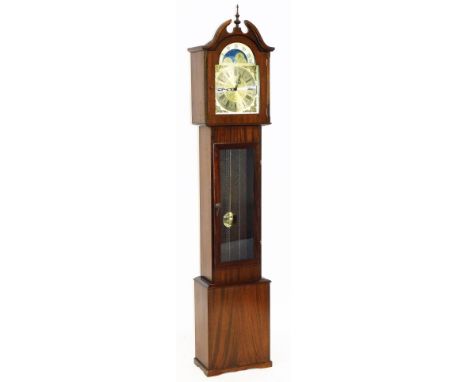 A mahogany cased long case clock, with a brass Roman numeric dial, moon phase dial with decorative spandrels, weight driven w