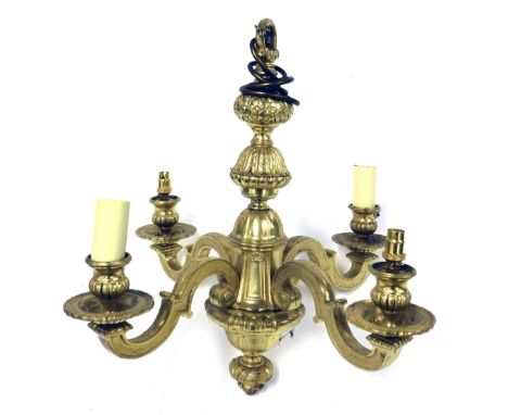 A heavy gilt four branch pendant light fitting, with stylised scroll branches and urn shaped sconces, 46cm high. 
