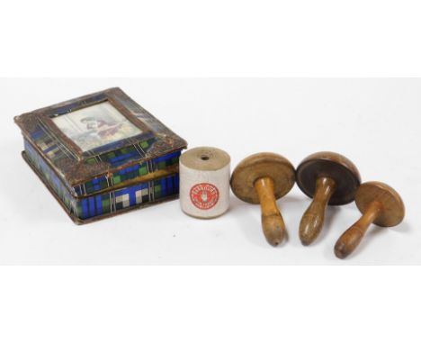 A group of sewing related items, to include a 19thC fruit wood reel holder in the form of an acorn, 5.5cm high, a marbled ena