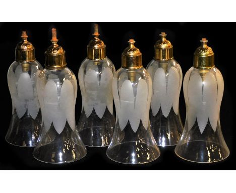 A set of six glass light shades, of flared slightly bulbous form, with acid etched decoration and gilt electric fittings, 20c