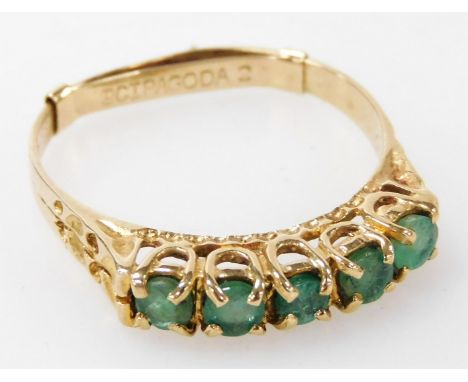 A 9ct gold and emerald five stone ring, in a high claw setting, size Q, 2.0g. 