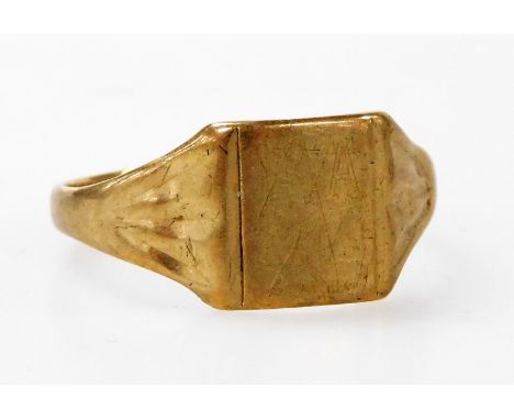 A 9ct gold gentleman's signet ring, with a vacant rectangular reserve, cut, size Z+2, 3.9g. 