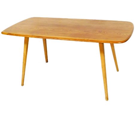 An Ercol light elm dining table, with a rectangular top, on tapering supports, the top 149cm x 74cm. 