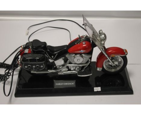 A HARLEY DAVIDSON TELEPHONE WITH A PLUG FOR A MODERN TELEPHONE NETWORK